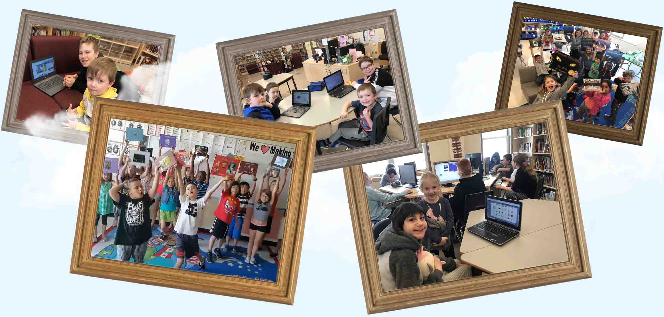 school children holding StoryJumper books they created in picture frames